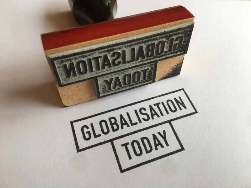 Black stamp on white paper reading, 'Globalisation today'.
